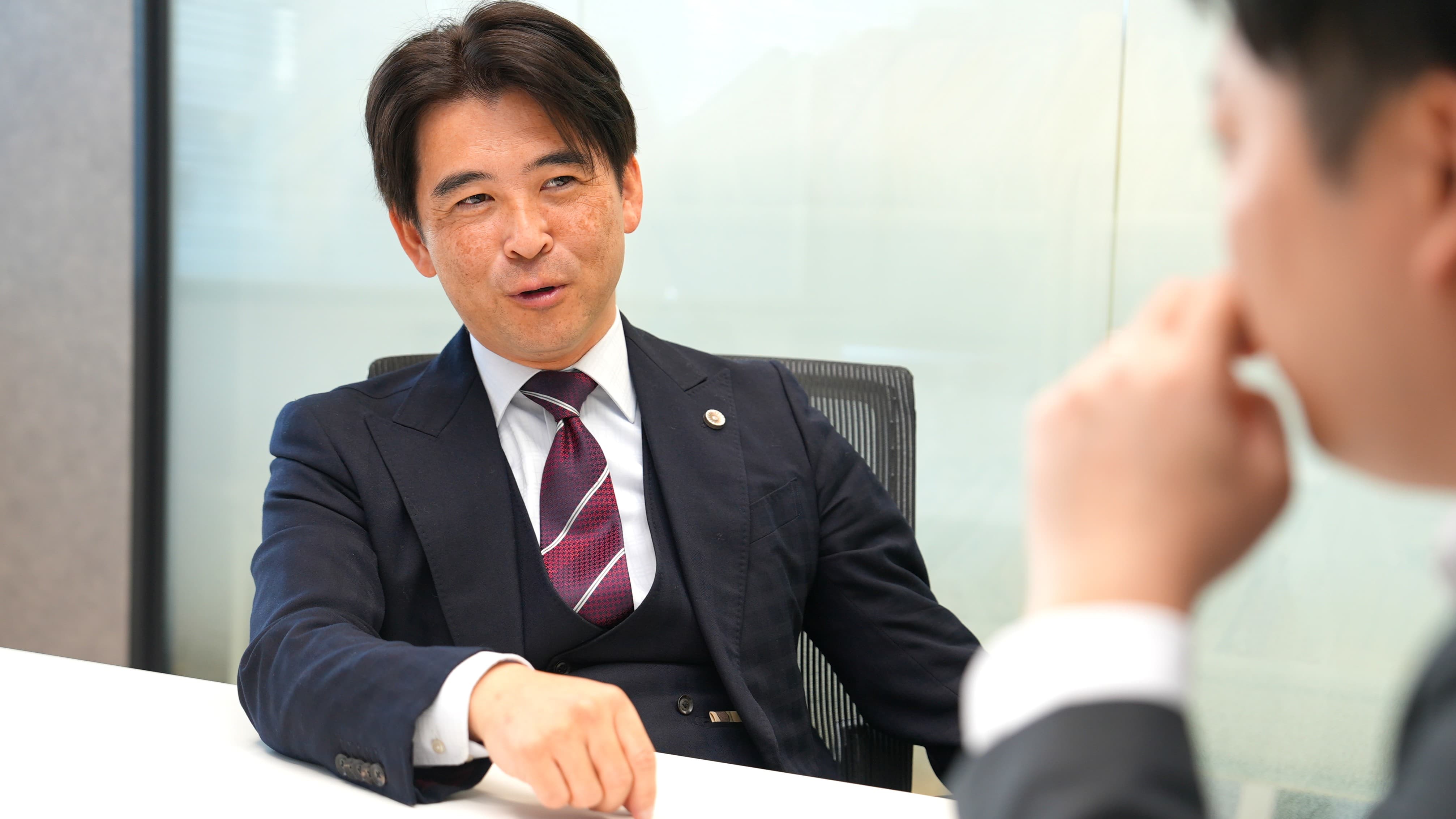 弁護士法人琉球スフィア代表久保氏の写真